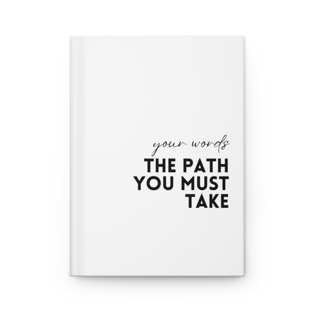White book cover with a black title "the path you must take" in white, handwritten style font, conveying introspection and personal reflection by iziiexpressions.com